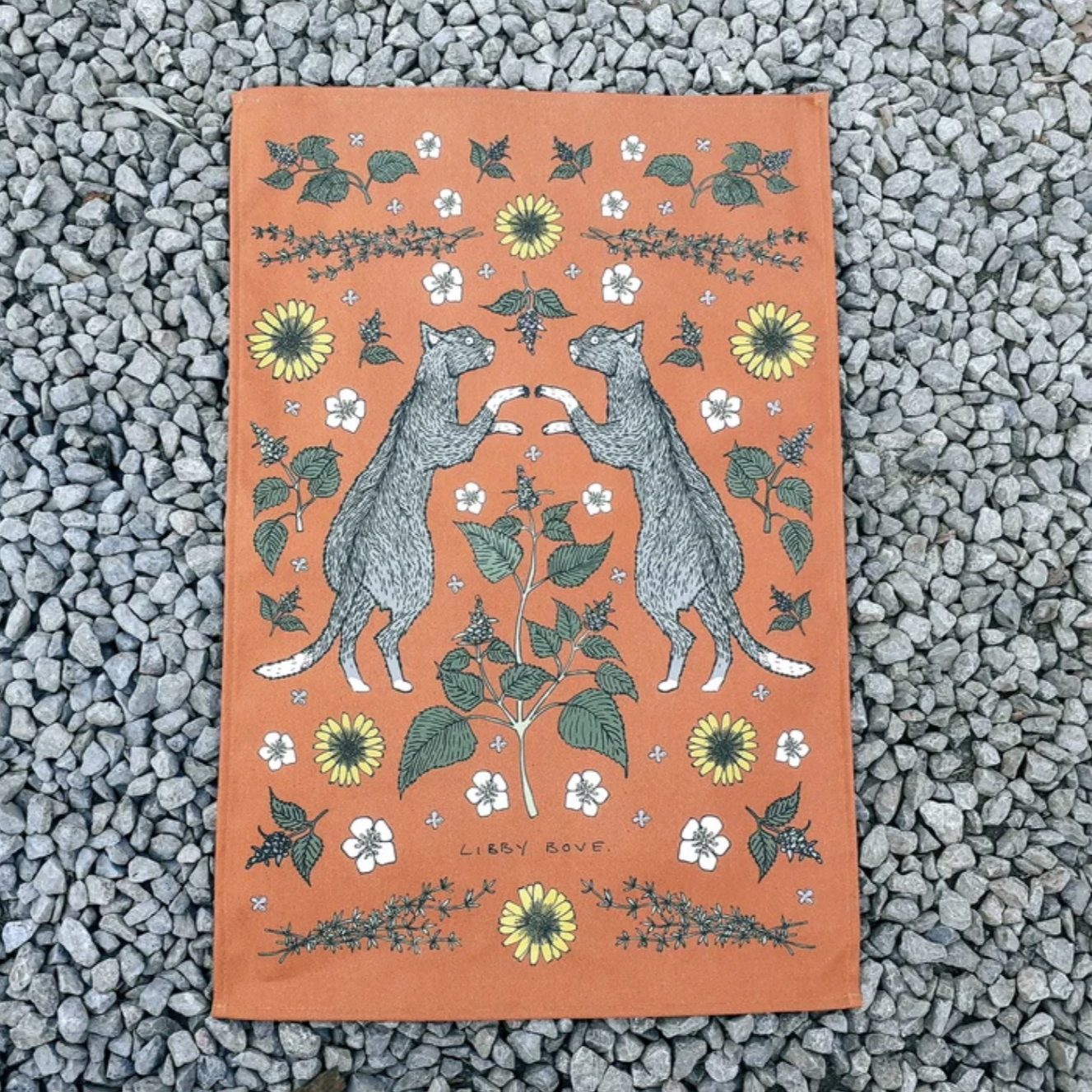 two cats with orange background, sunflower and leaves 
